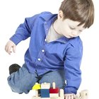Infant Boy Playing with Toys