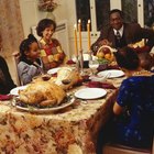 caucasian family at dinner table