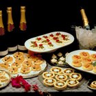 Italian antipasti wine snacks set over black grunge background