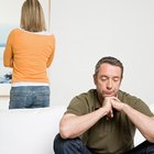 Sad woman thinking on couch after fight with husband