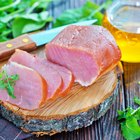 Man slicing Dalmatian prosciutto