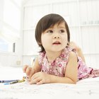Infant Boy Playing with Toys