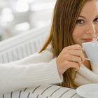 Asian woman holding tea cup