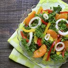 Fresh chard leaves in wooden bowl