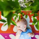 Baby chewing on teething ring