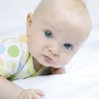 Sequence Showing a Baby in a Nappy Learning to Walk