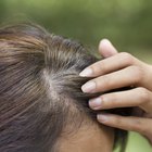 Woman inspecting split-ends