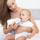 Pregnant woman eating a chocolate