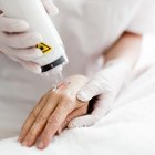 Woman receiving alternative therapy on face