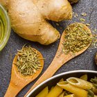 Garlic cloves and bulb on cutting board