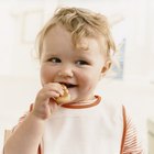 baby vegetable puree on wooden background top view