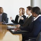 Multi-ethnic businesswomen discussing paperwork