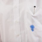 Ink spot on white shirt