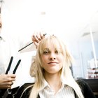 Smiling woman combing her hair