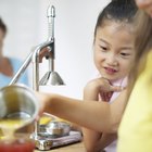 Lemon half and juice squeezer, close-up