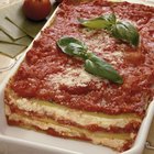classic vegetarian lasagna on a gray stone background