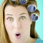 low angle view of a mother putting curlers in her daughter's hair