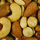 Bowl with pistachios on the table. Top view.