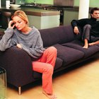 Grandparents Talking to Children's Family in Living Room