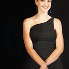 Young woman posing in black dress