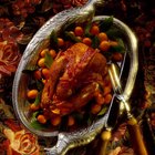 Grilled pheasant with bacon and spices and vegetables