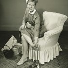 Woman holding hairdryer