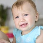 Baby eating rice cakes