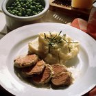 Top loin steaks on cutting board, high angle view, close up