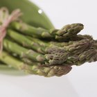 asparagus on wood background.