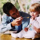 Thoughtful preschooler girl refusing to eat