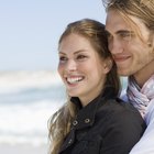 Senior couple holding hands on beach