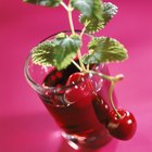 Apple juice and apples on the table