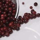 Close-up shot of blueberries on a wooden surface