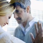 Young couple during indoor quarrel