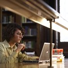 Woman and child using laptop