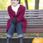 Smiling woman in sweater and scarf