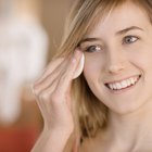 Mature woman laughing, eyes closed, close-up