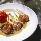 rack of lamb on grill with an asparagus