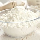 Paper bags with different types of flour, closeup