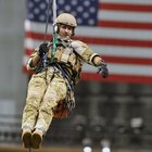 Sailor saluting with fireworks