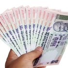 Qual porcentagem da receita bruta da empresa deve ser destinada para os salários dos funcionários?