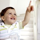 Side view of mother laughing with baby