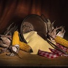 Flour in a bowl on a rustic wooden kitchen table