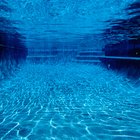 Como calcular a área de superfície de uma piscina oval