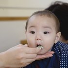 Mother and baby in cafe by the window