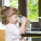 Little boy drinks milk coctail