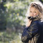 Blonde in leather jacket, pointing