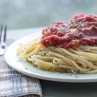 Spaghetti with chicken meatballs and broccoli.