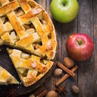 Mixing bowl, rolling pin and pie pan on kitchen counter