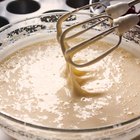 Preparing dough for baking homemade pumpkin bread.